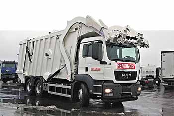 MAN TGS 33.360 6×4 BB-WW с оборудованием Faun - грузовик-мусоровоз